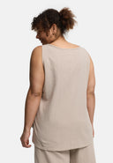 'Cotella' Capa – ligera, natural y moderna