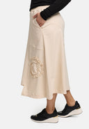 Saia 'Livia' – Linha A, assimétrica e elástica